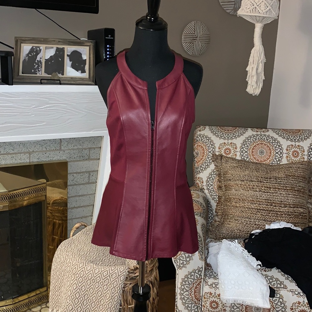 Venus peplum top with full zip up.